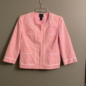 INC pink jacket, size 8. Front closure 4 front pockets, white trim. 3/4 sleeves.